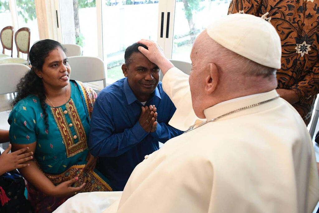 Pope Francis met some of the poor, refugees and elderly people of the Community of Sant'Egidio upon his arrival in Indonesia